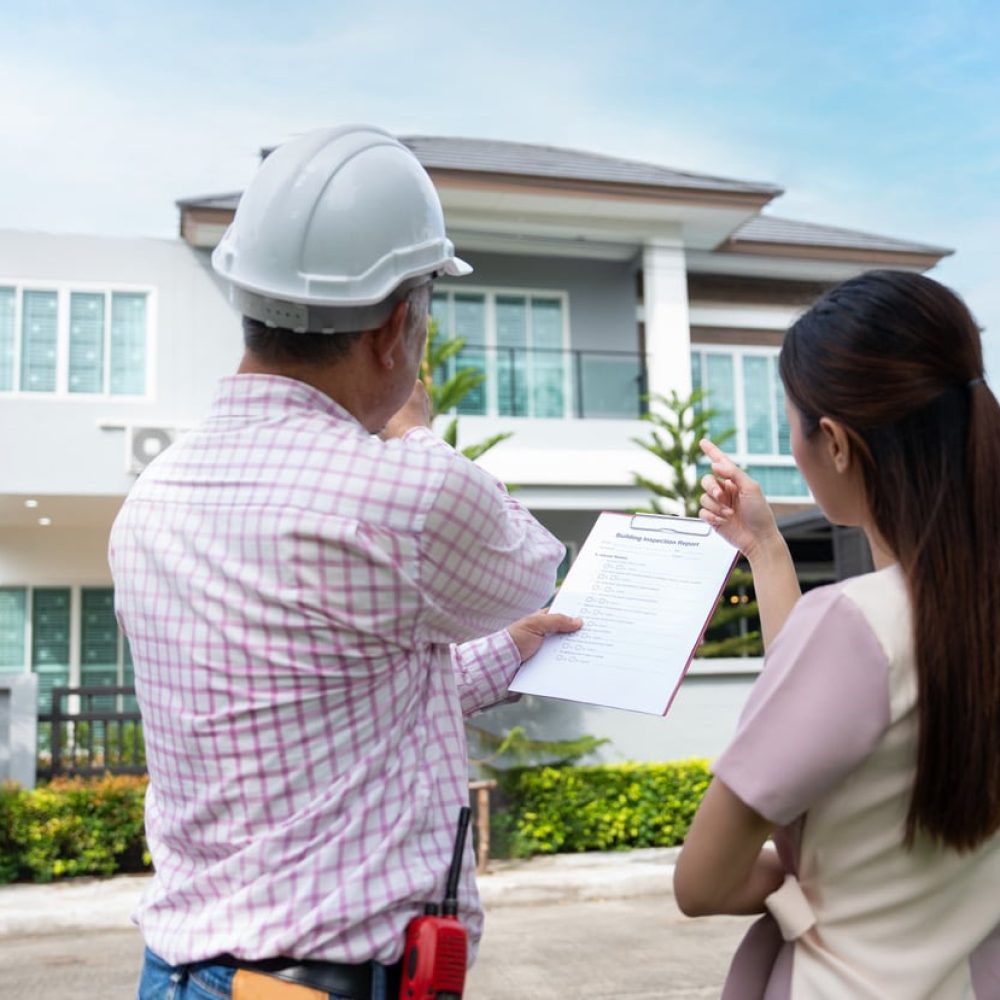 Senior home inspector explains Inspection results with homeowner, handyman holding clipboard and after checking details before renovations home, house improvement interior, Interior design Real estate